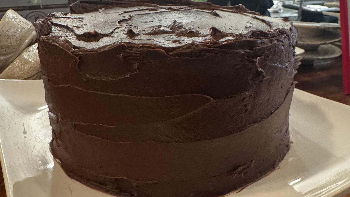 Devil's food cake sits on a table in the kitchen in amilinda.