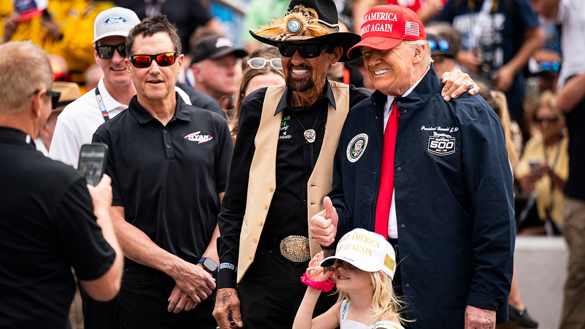 Donald Trump and Richard Petty pose for a photo