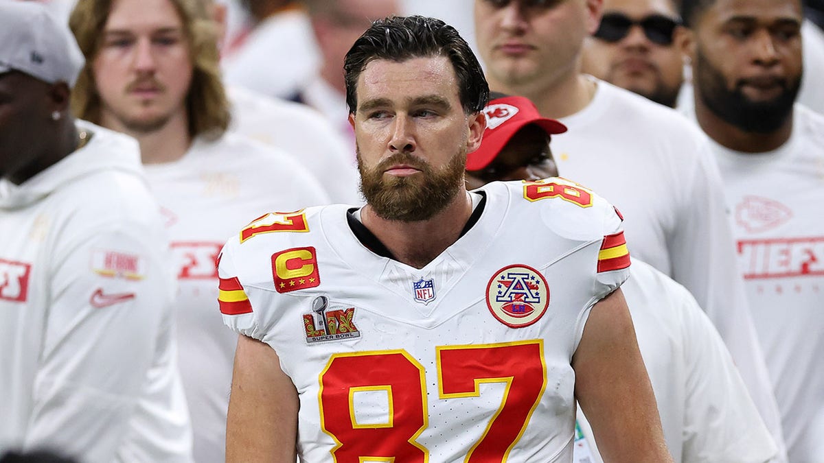 Travis Kelce looks on