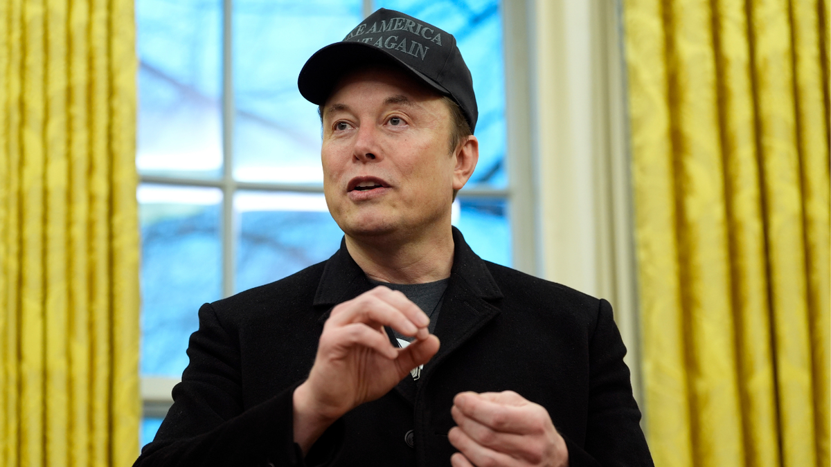 Elon Musk speaks during an event in the Oval Office with President Donald Trump at the White House, Tuesday, Feb. 11, 2025, in Washington. (AP Photo/Alex Brandon)