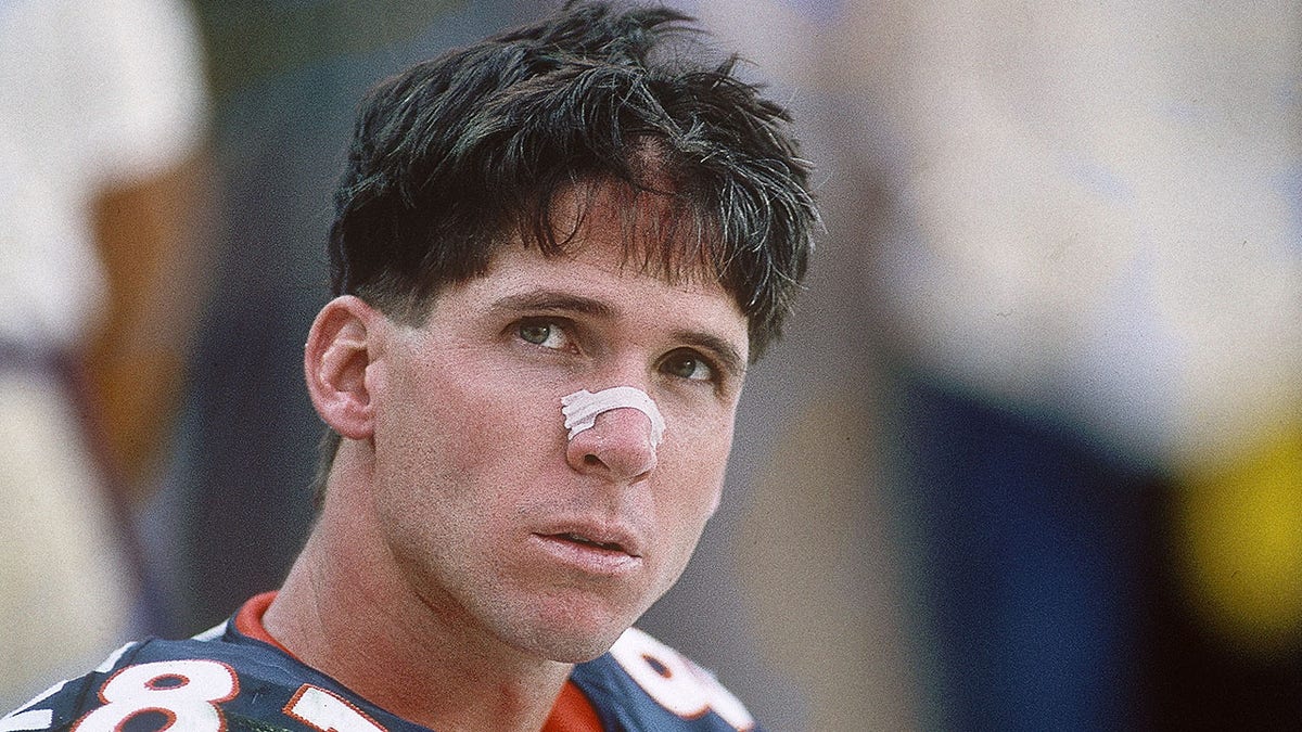 Ed McCaffrey on the bench