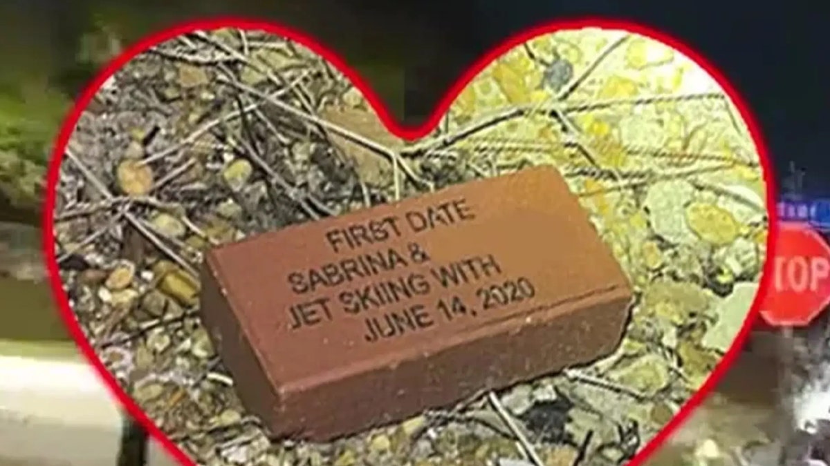 Woman is seen throwing "first date" brick in ex-boyfriend's window