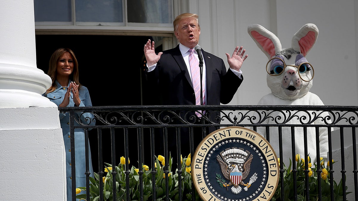 President Donald Trump and First Lady Melania Trump, accompanied by the Easter Bunny.