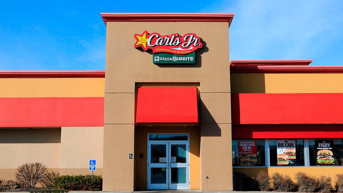 Carl’s Jr edifice  with institution  motion   and logo supra  entrance,