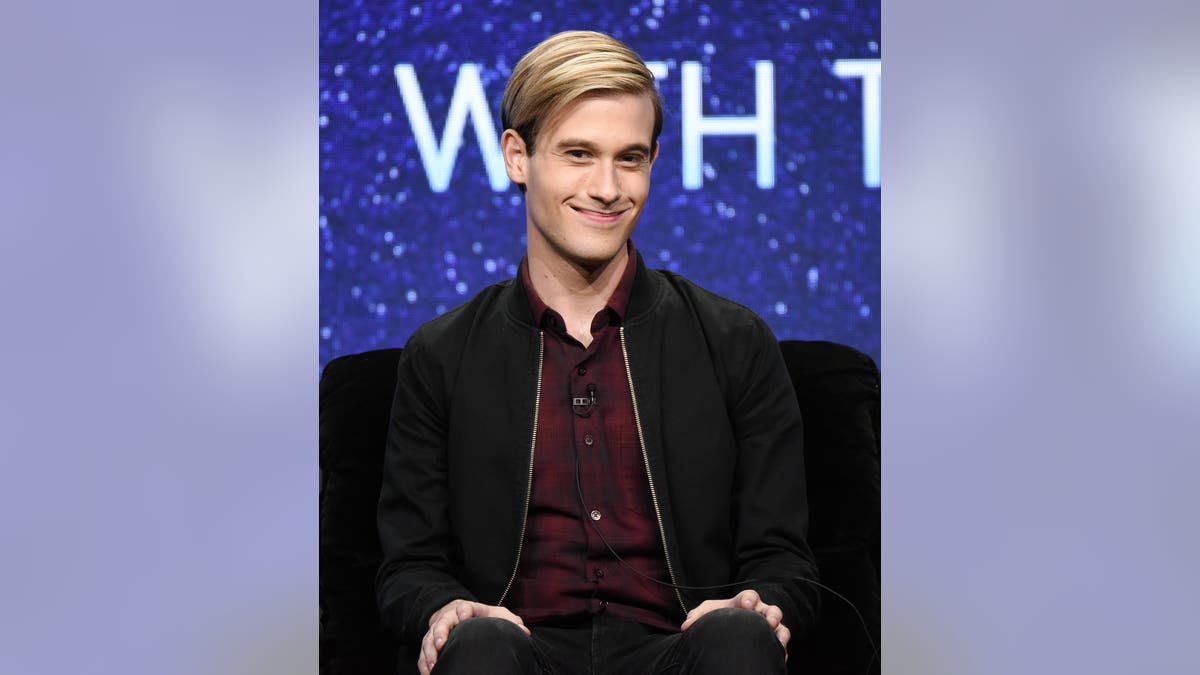 tyler henry smiling