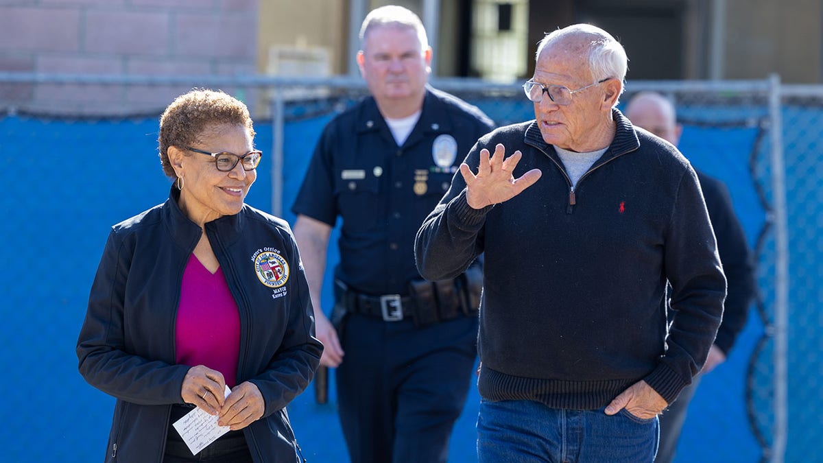 Los Angeles Mayor Karen Bass, left, and her disaster-recovery czar Steve Soboroff, right, arrive at a press conference at Palisades Recreation Center on Monday, Jan. 27, 2025 in Pacific Palisades, CA. 