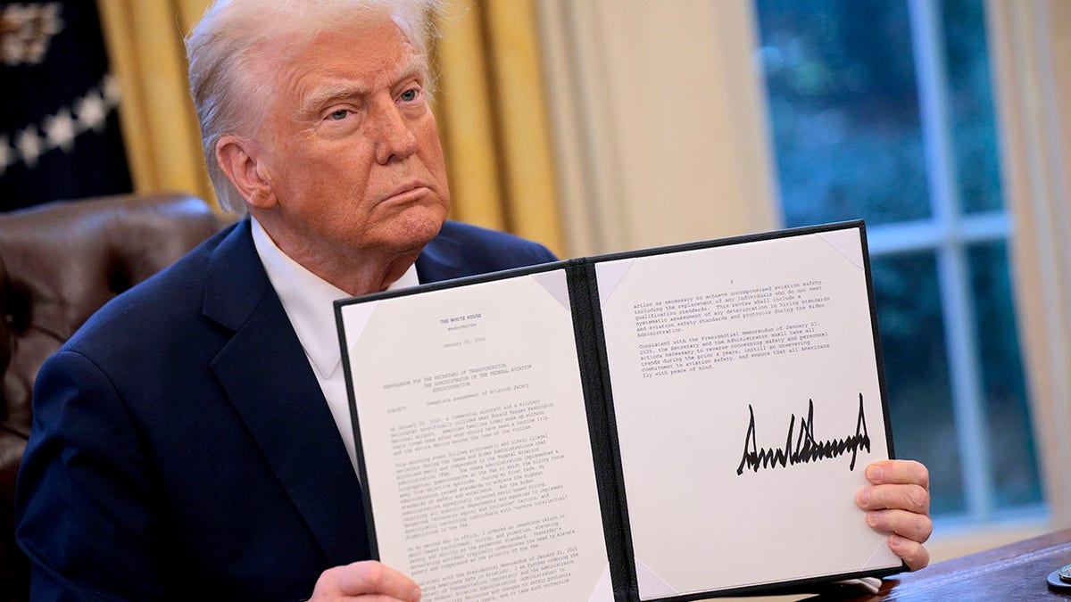 Trump holds executive orders in the Oval Office