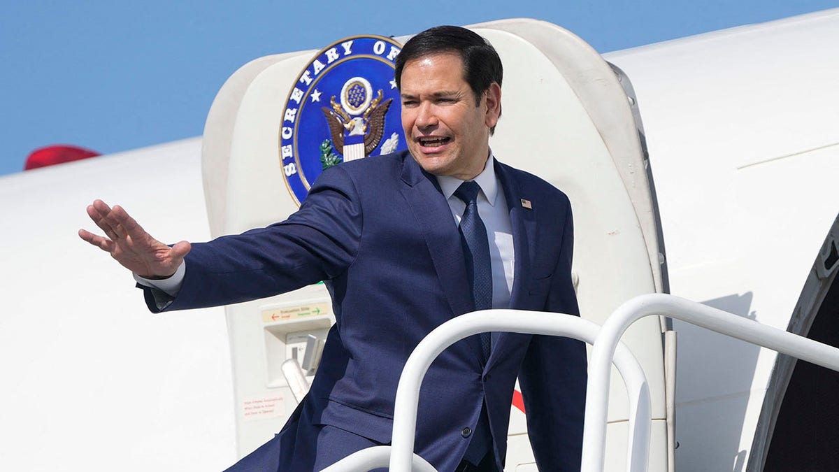 U.S. Secretary of State Marco Rubio boards a plane en route to El Salvador at Panama Pacifico International Airport in Panama City on Feb. 3, 2025. 