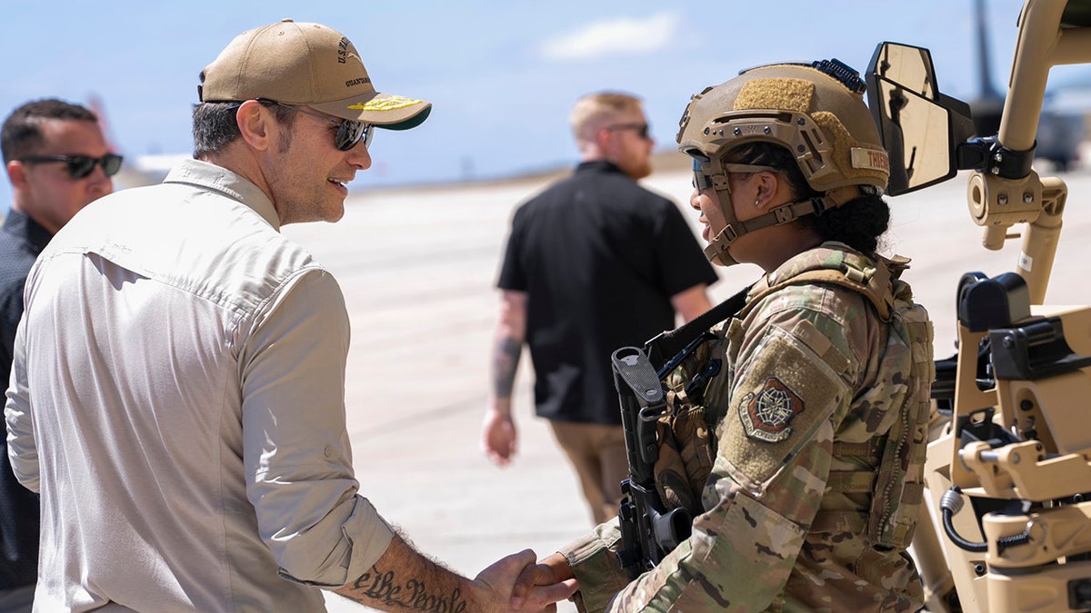 Defense Secretary Pete Hegseth seen greeting troops at Guantanamo Bay, Cuba.