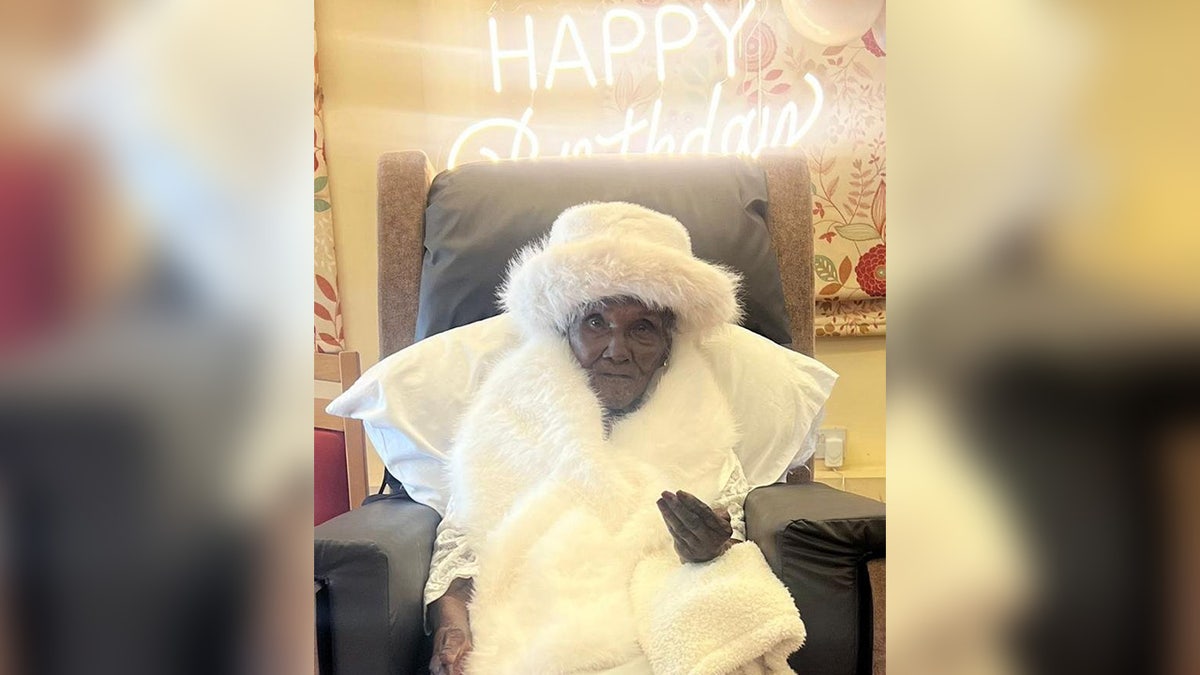 107-year-old great-great-great grandma celebrates birthday in fashionable attire.