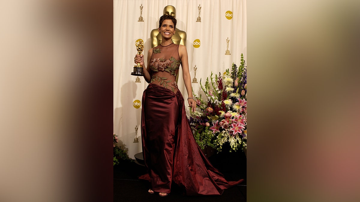 Halle Berry wore a red dress with floral embroidery to the Oscars in 2002.