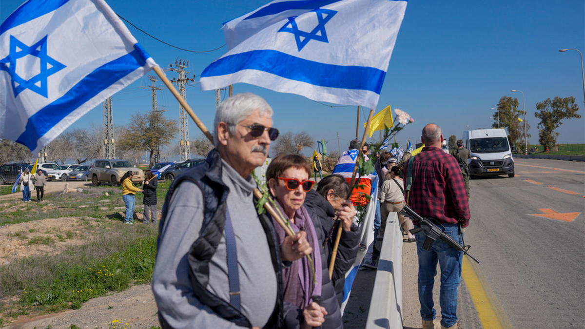 The Israelis connect the highway during a funeral procession.