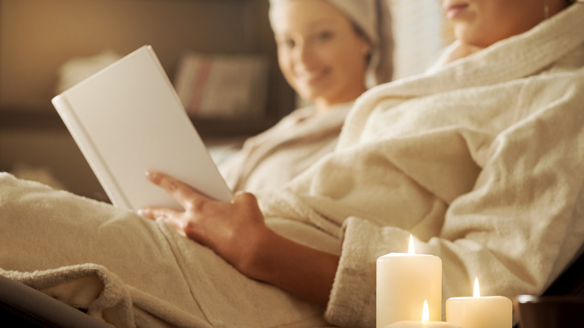 Travelers relaxing at a spa while on vacation.