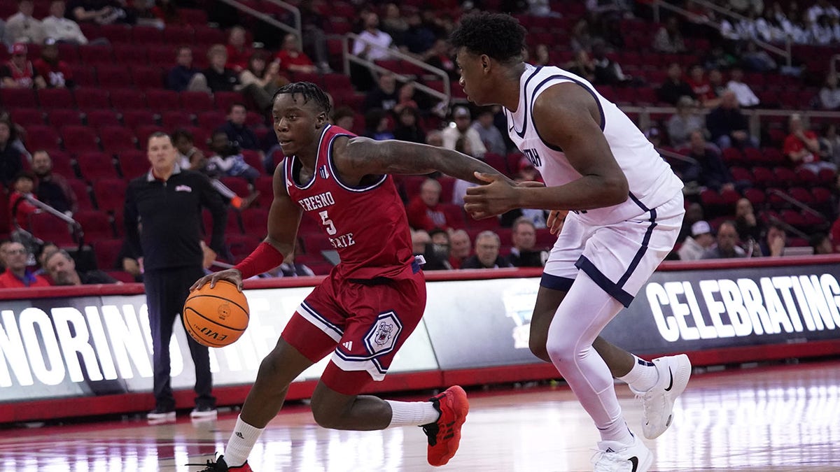 Jalen Weaver dribbling