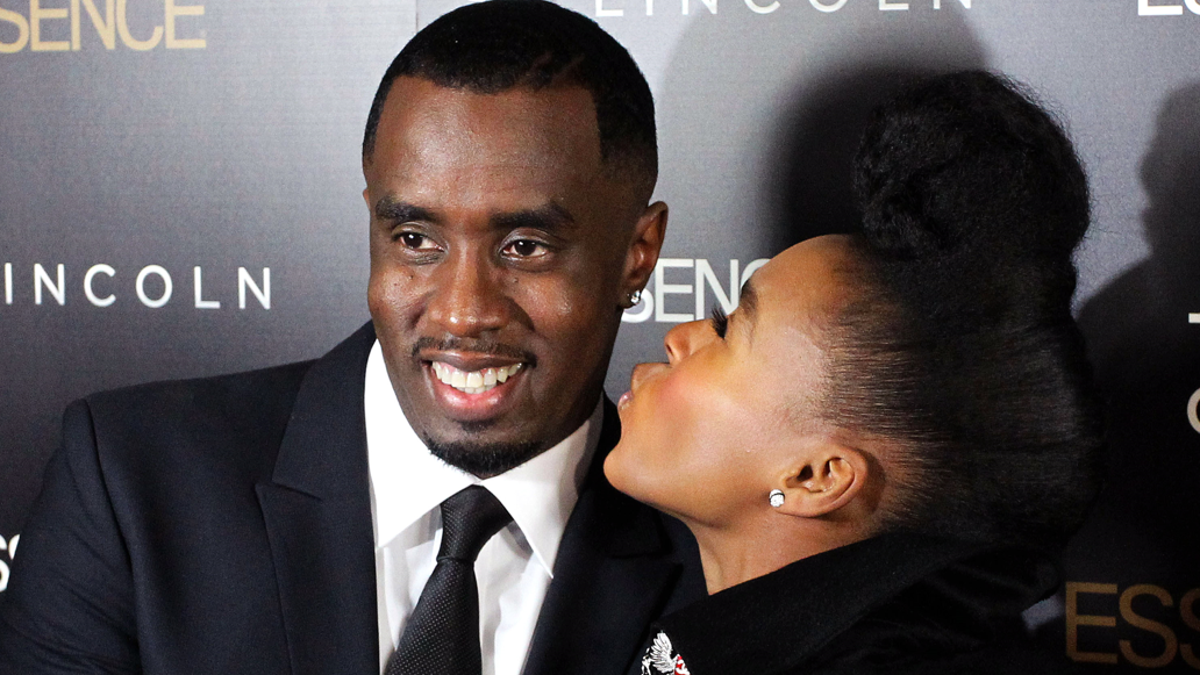 Sean "P. Diddy" Combs and Janelle Monae airs  for a photo.