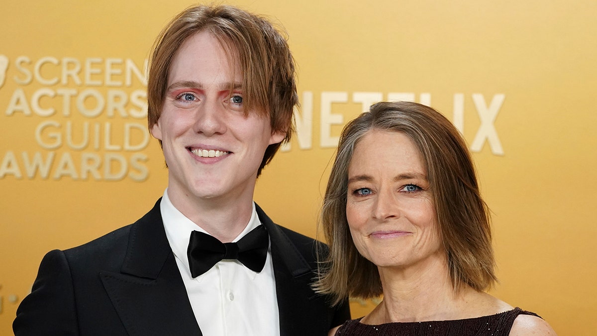 Jodie Foster poses next to son Charlie on the SAG Awards red carpet