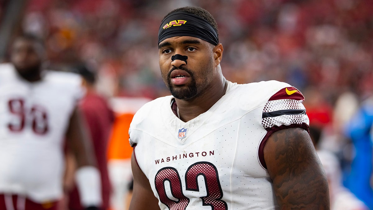 Jonathan Allen looks on