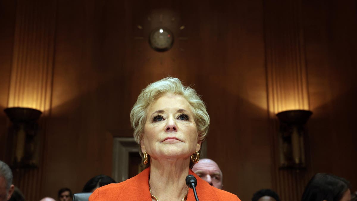 closeup on Linda McMahon testifying to Senate