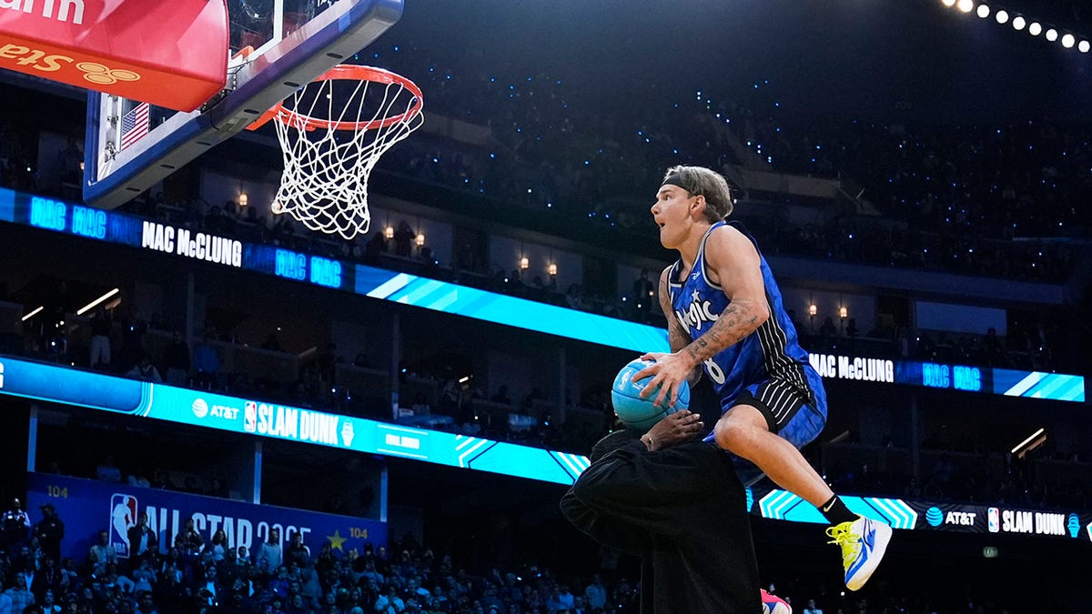 Mac McClung dunks over Evan Mobley