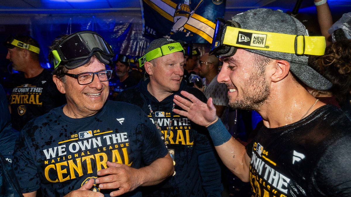 Sal Frelick and Mark Attanasio celebrate