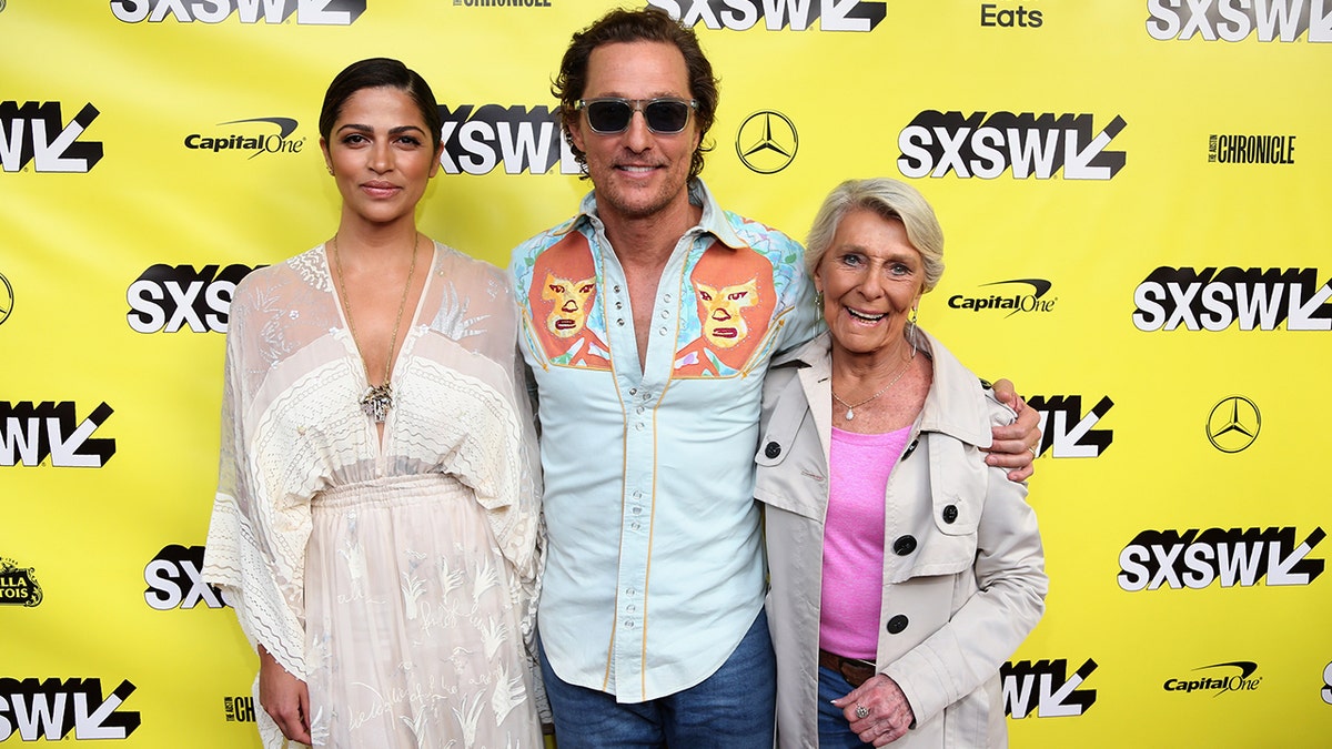 Matthew McConaughey with his ma  Kay and his woman  Camila Alves.