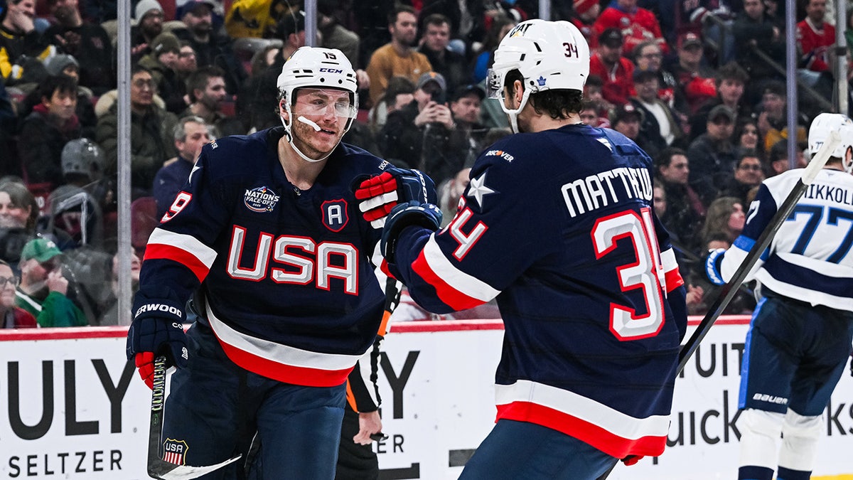 Matthew Tkachuk celebrates with Auston Matthews