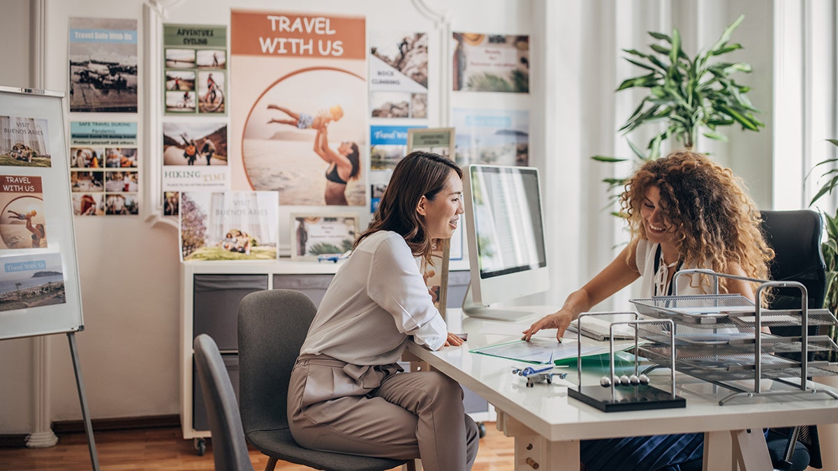 woman meeting with her travel agent