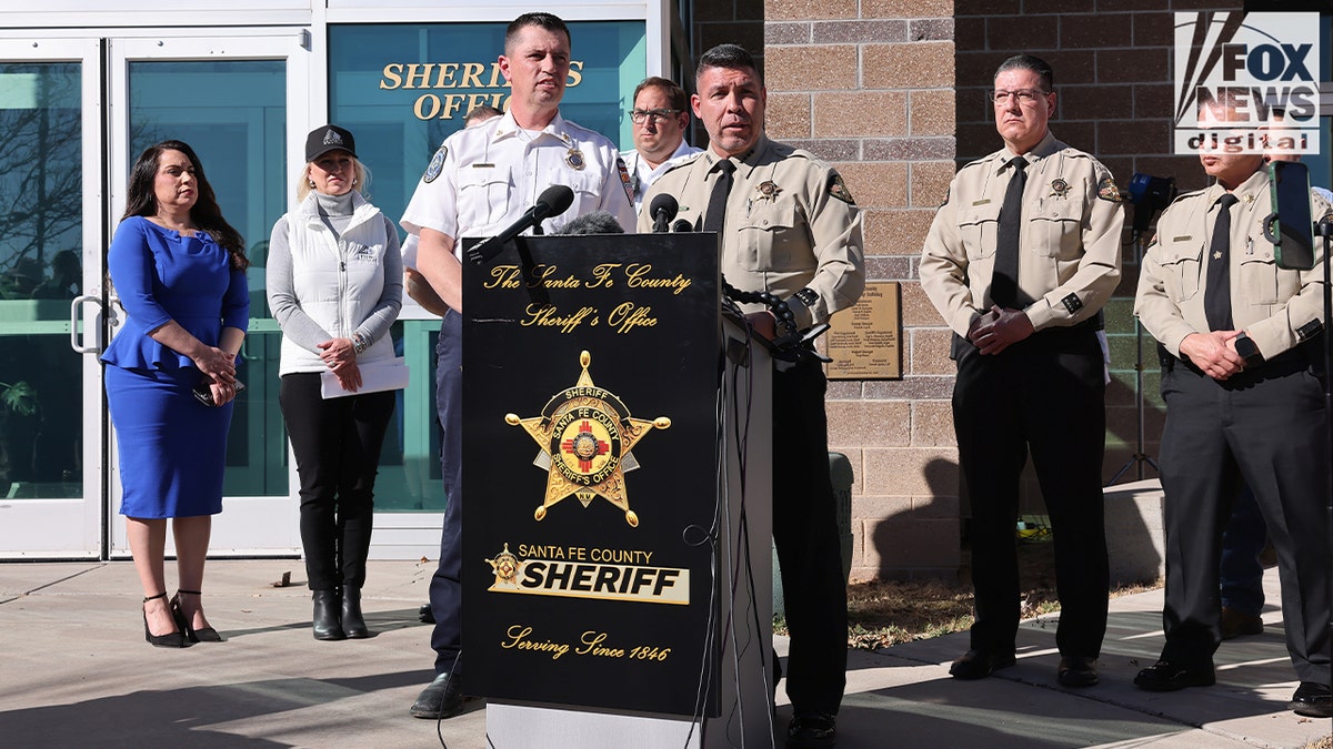 Mendoza giving updates during a press conference regarding Gene Hackman's death.