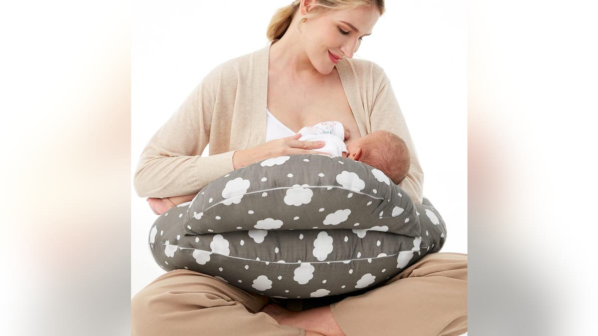 This pillow takes pressure off mom's arms and back while nursing.