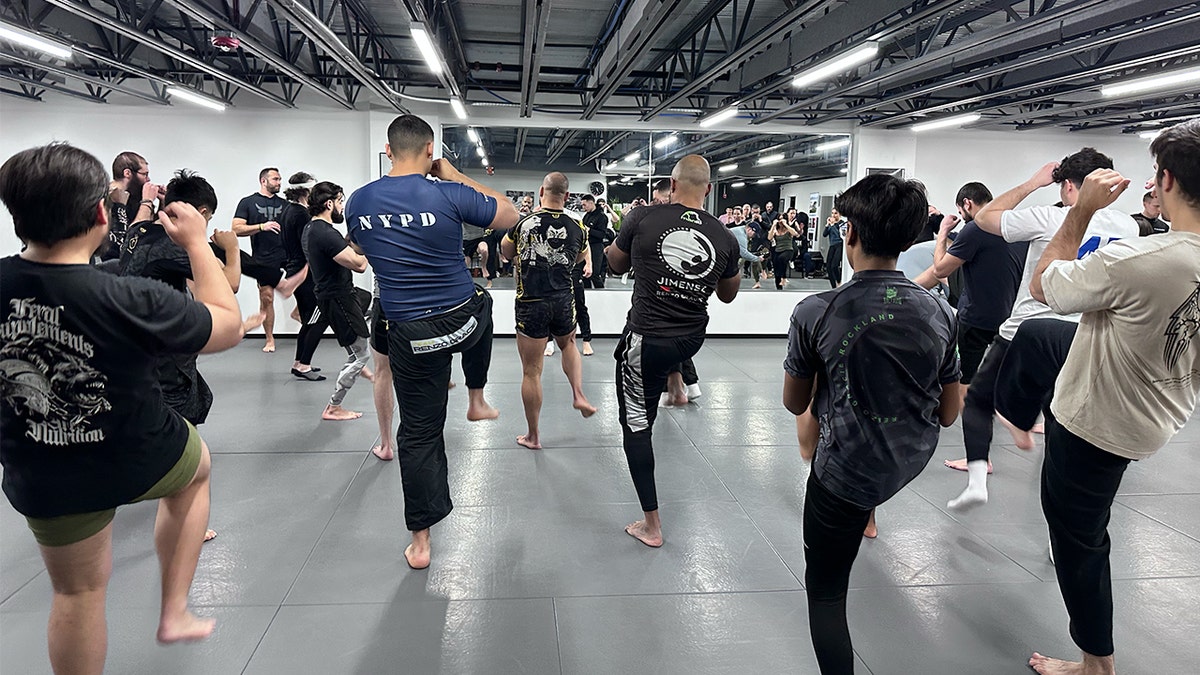 People of all ages learning self-defense skills from Natan Levy