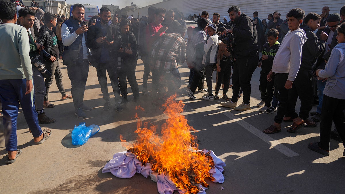 Palestinians burn shirts in Khan Younis