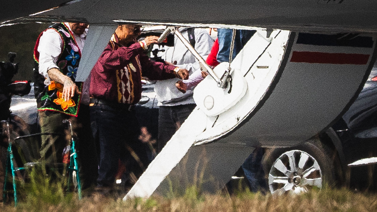 Leonard Peltier boards a private plane after his release from federal prison