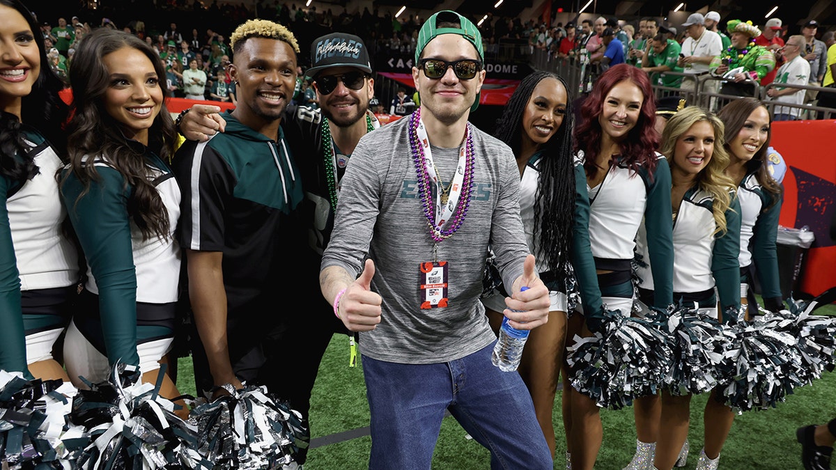 Pete Davidson is playing with cheerleaders in the Super Bowl.