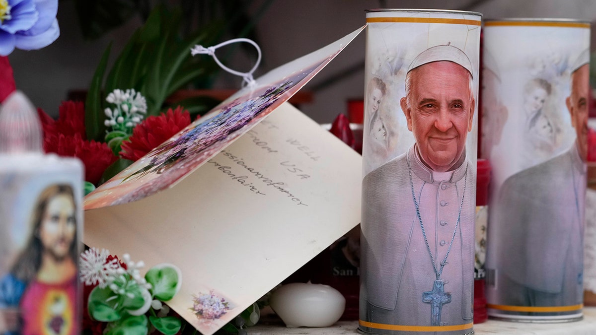 Candles outside hospital where Pope Francis is receiving treatment