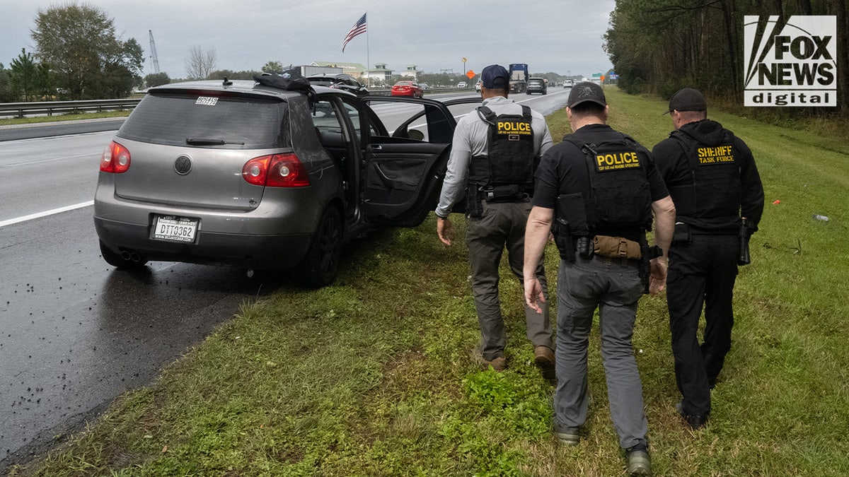 Law enforcement officers stop suspected illegal immigrants in Florida