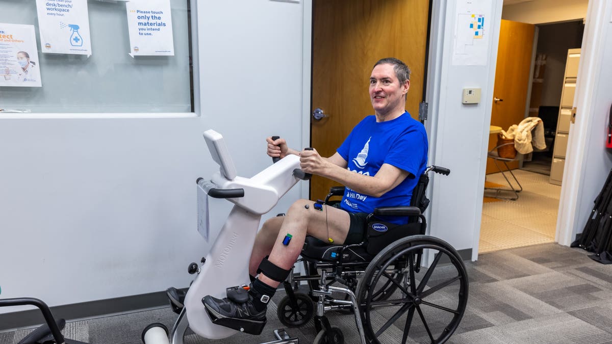 Research participant Doug McCullough uses an adaptive exercise bike during a testing session at the University of Pittsburgh.