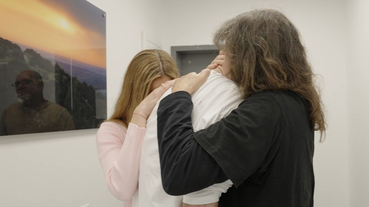 Sagui Dekel-Chen hugs mother