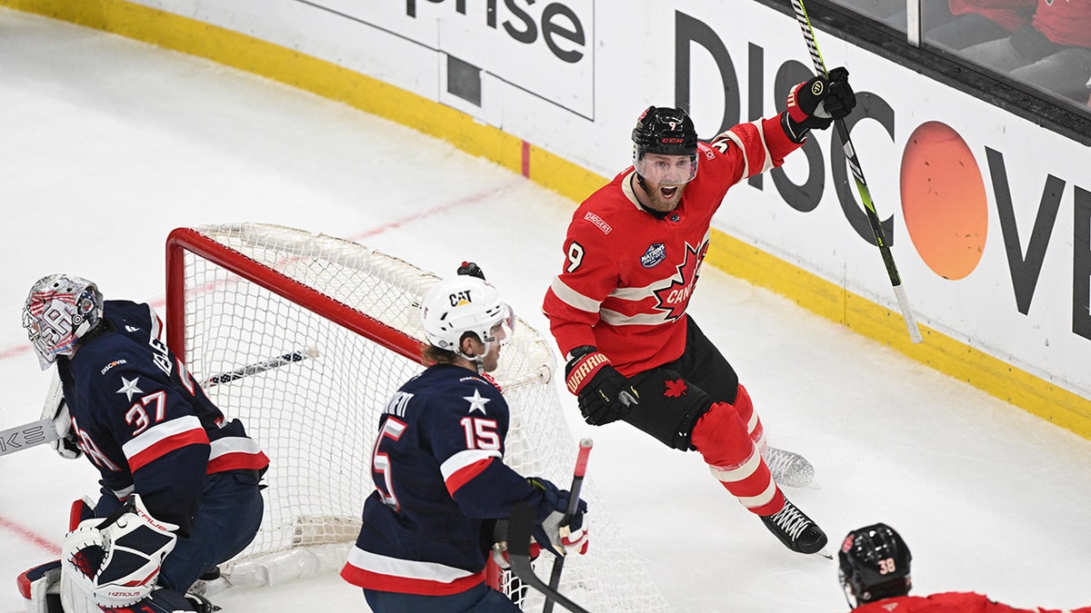 Canadian forward Sam Bennett (9) celebrates the score against U.S. goalkeeper Connor Hellebuyck (37) in the second phase of the 4-country vs. ICE hockey championship game against TD Garden in the second country.