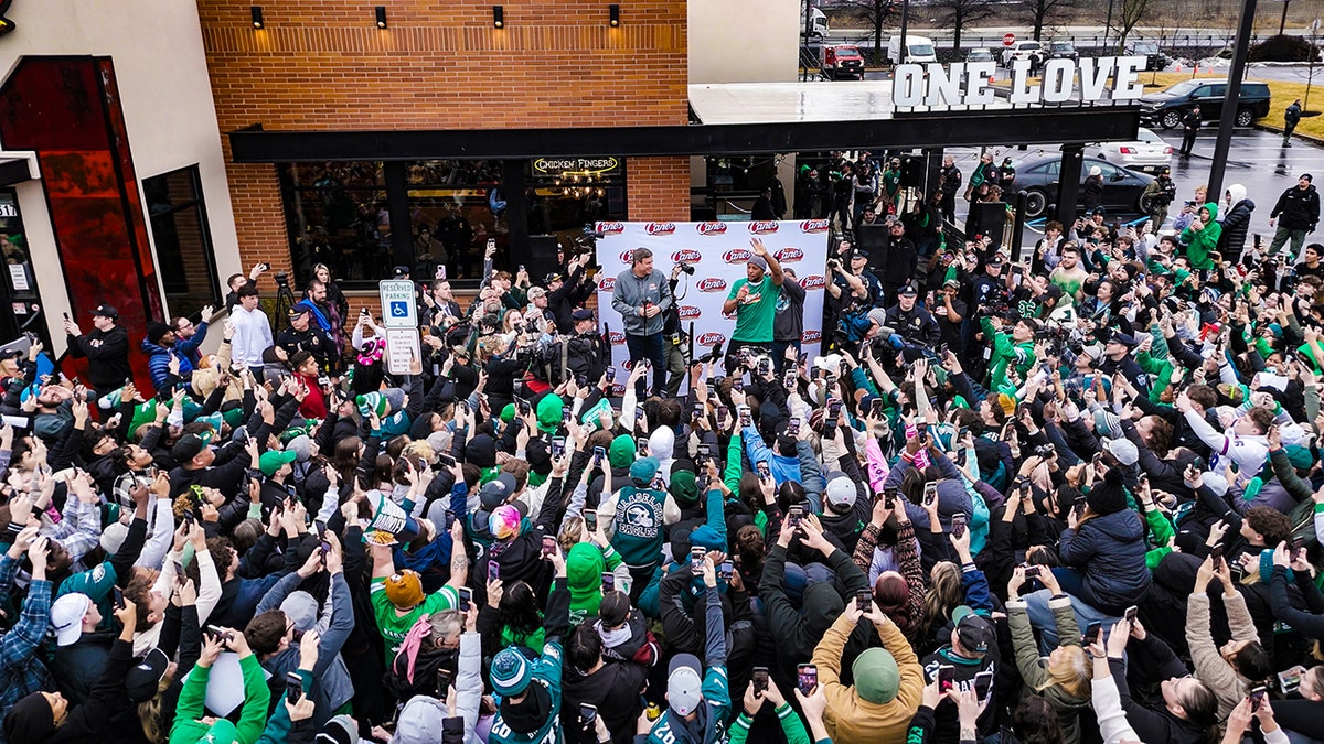 Aerial view of Eagles fans and Saquon Barkley