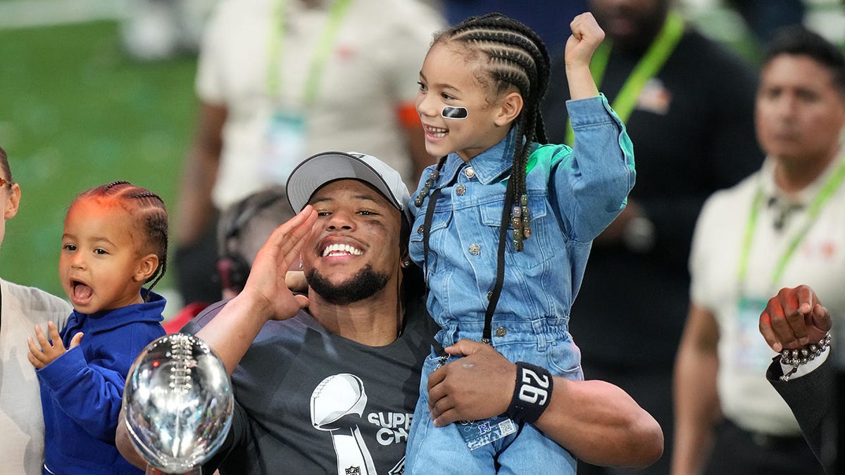 Saquon Barkley celebrates the victory of Super Bowl Lix