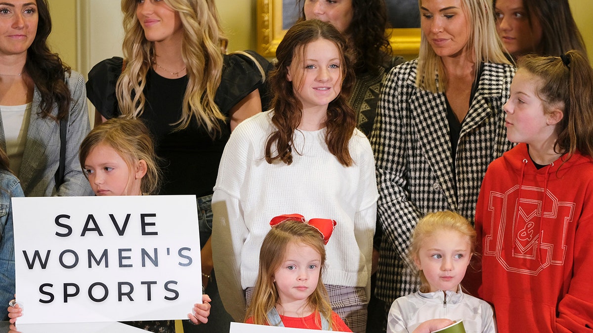 Oklahoma Gov. Kevin Stitt signs the Save Women in Sports Act at the state Capitol in Oklahoma City on March 30, 2022.