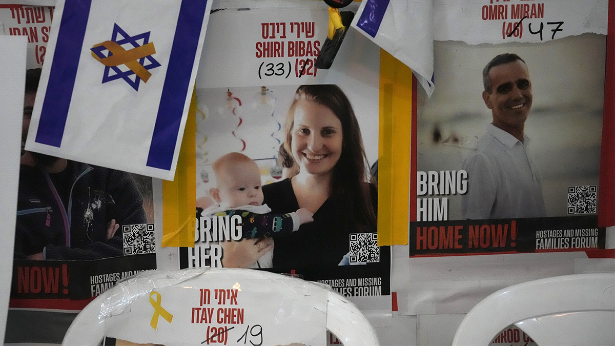 A poster shows Shiri Bibas, who was kidnapped to Gaza with her husband and two young children