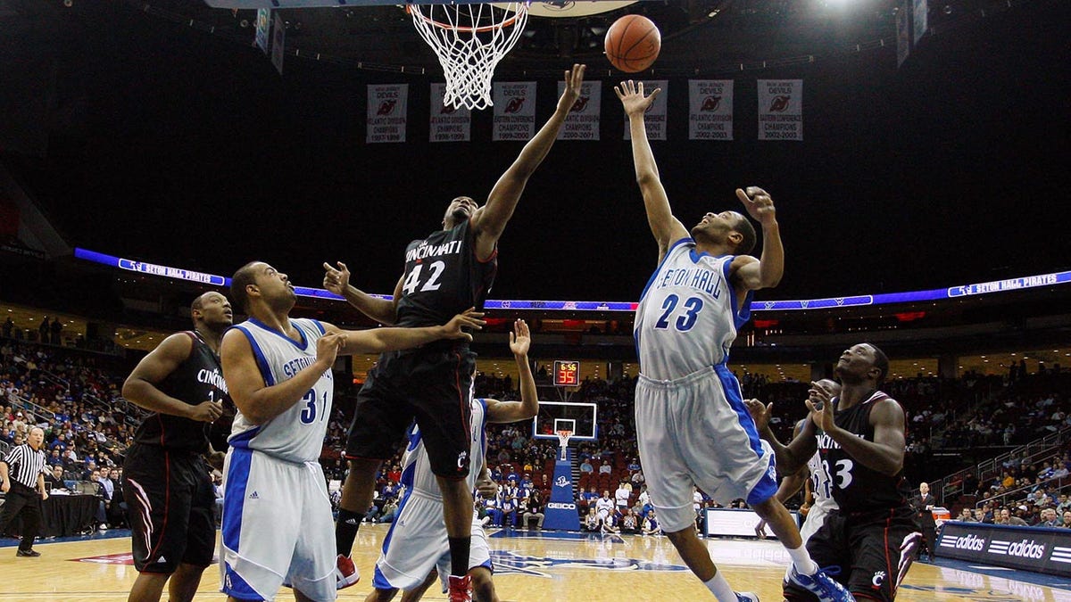 Steve Toyloy battles for the rebound