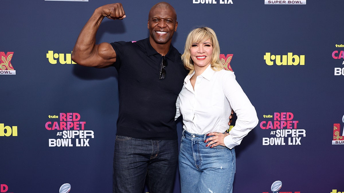 Terry Crews and his wife, Rebecca at the Super Bowl