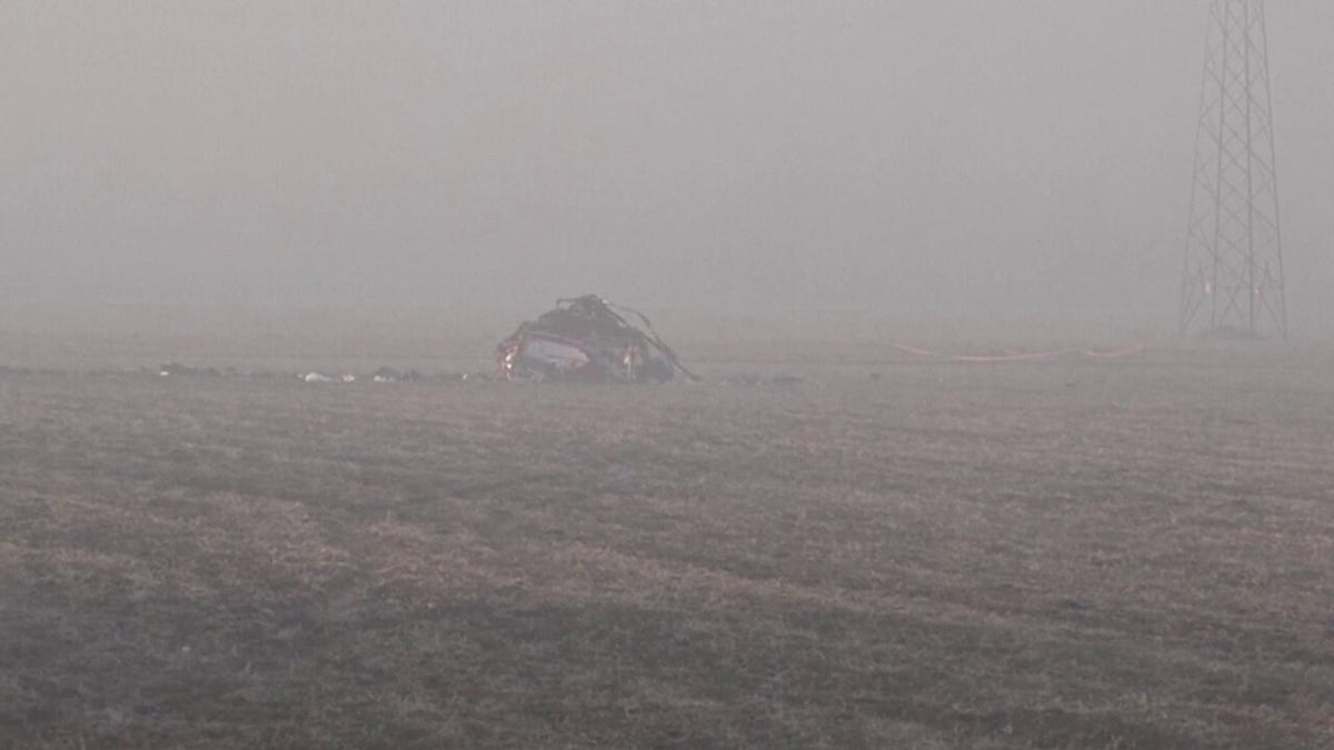 Foggy helicopter crash scene