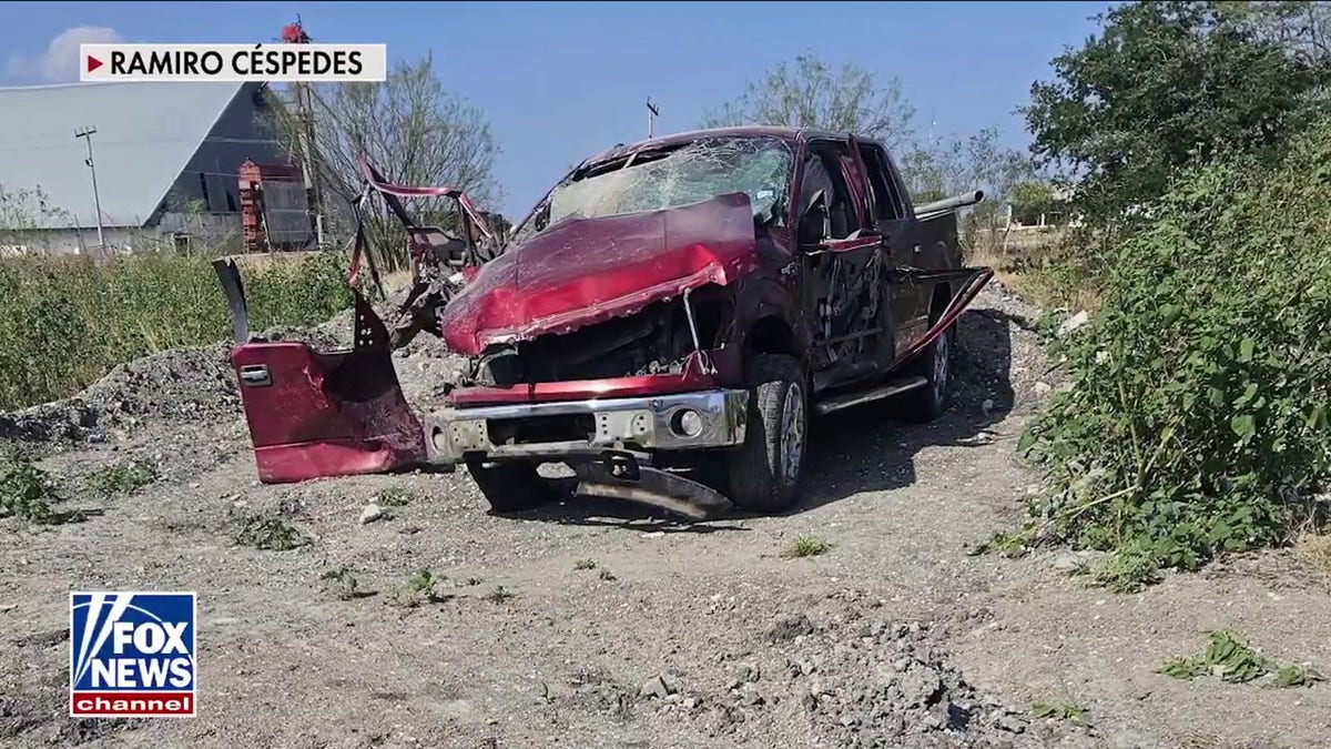 red truck damaged by explosion