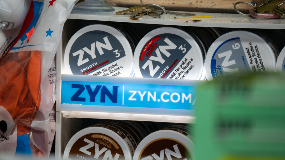 Zyn Canisters on a screen in a store