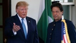 President Donald Trump greets then Pakistan's Prime Minister Imran Khan  at the White House, during his first term as president. July 22, 2019.