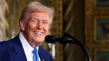 President Donald Trump speaks at Mar-a-Lago in Palm Beach, Fla., Tuesday, Feb. 18, 2025. (Pool via AP)
