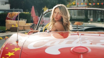 Fast-food chain bucks 'woke' Hollywood, brings back iconic bikini-clad ad for Super Bowl - Fox News